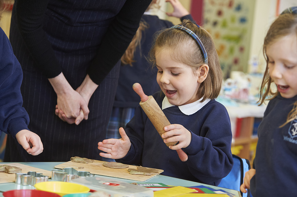 Study girl using a rolling pin