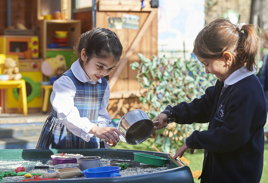 Study girls in Reception outdoor learning space