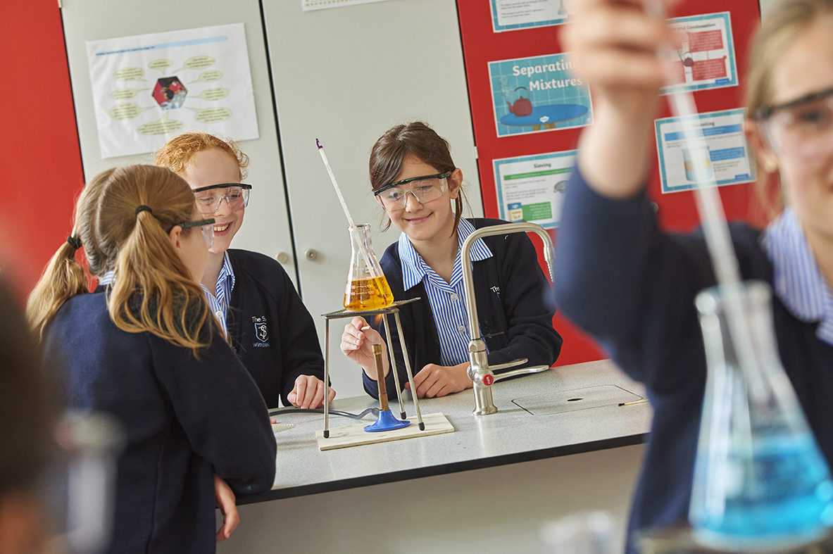 Study girls in science lab at Spencer House