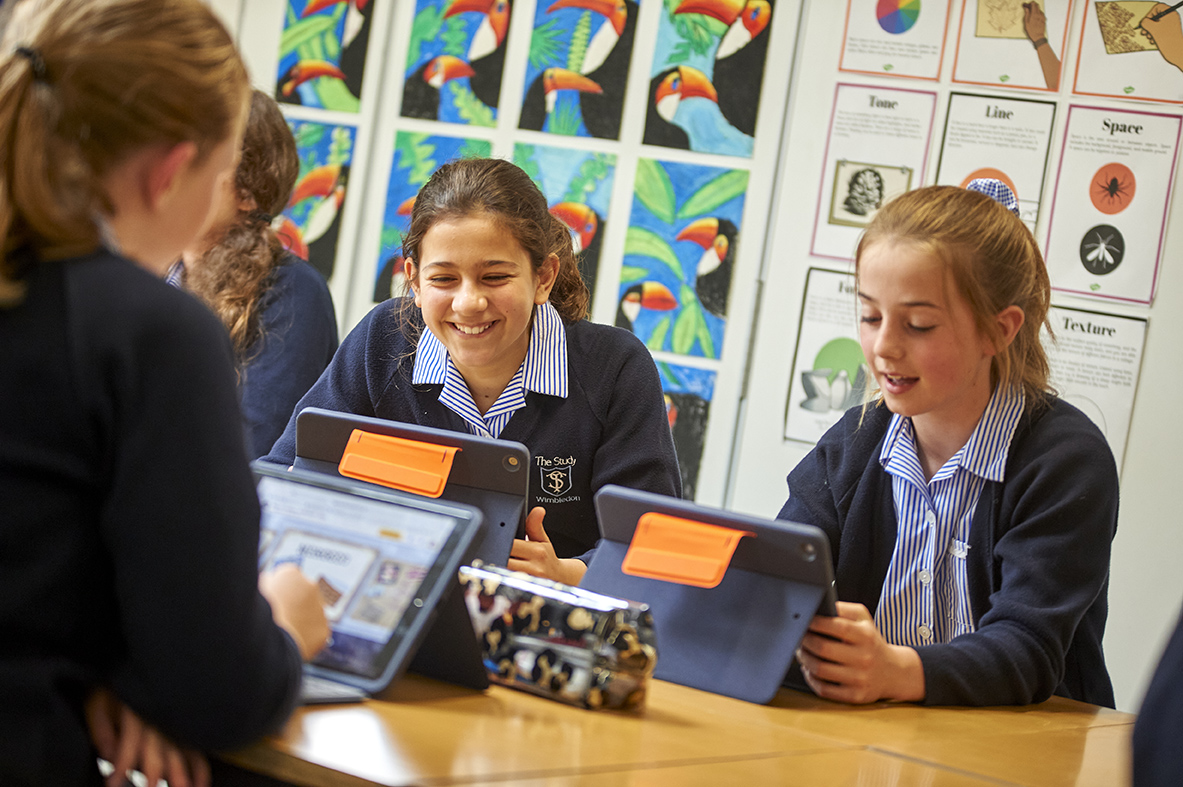 Girls at The Study in a lesson with i-pad's